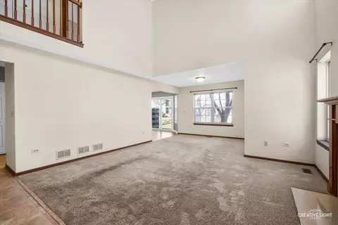 Living - 651 Lancaster Cir, Elgin, IL 60123 photo 2 of 3