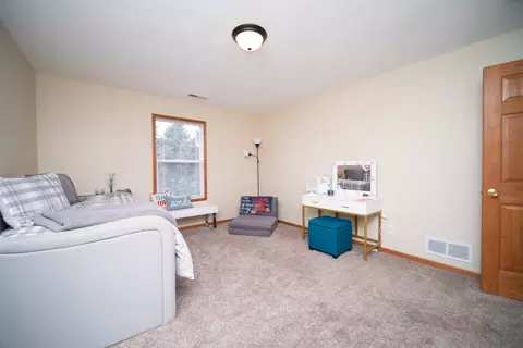 Bedroom - 10178 Monarch Rd #D, Roscoe, IL 61073 photo 3 of 4