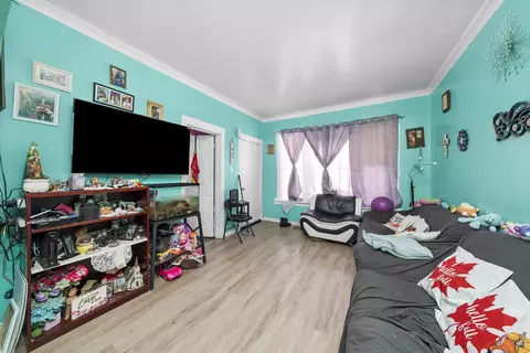Living - 149 E 120th St, Chicago, IL 60628 photo 1 of 1