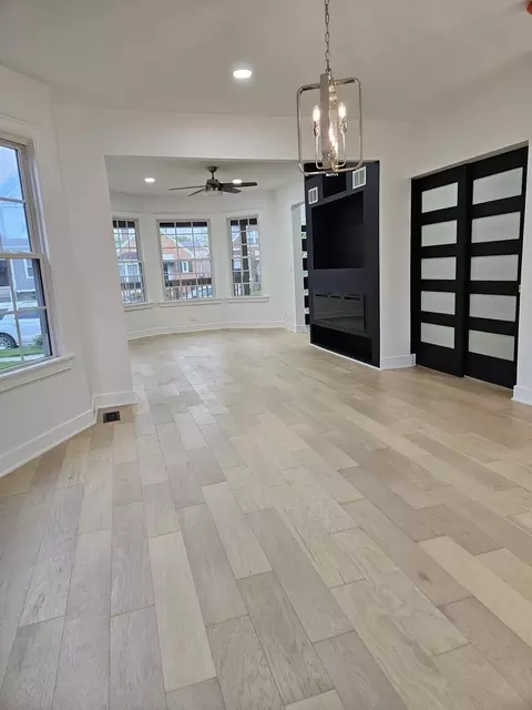 Living - 5402 N Mobile Ave, Chicago, IL 60630 photo 2 of 2