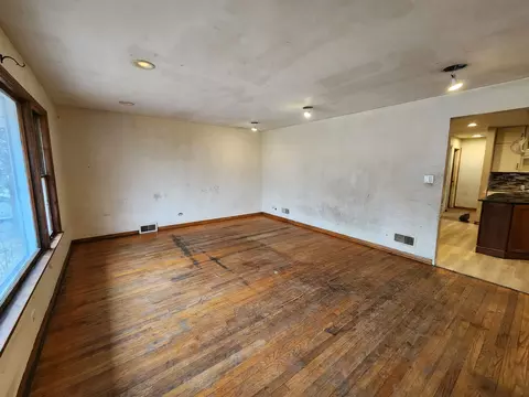 Living - 143 E 119th St, Chicago, IL 60628 photo 2 of 2