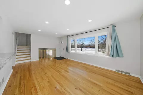 Living - 7635 S Oconto Ave, Bridgeview, IL 60455 photo 3 of 7
