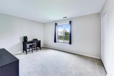 Bedroom - 1048 Harbour Ct #2B, Wheeling, IL 60090 photo 3 of 5