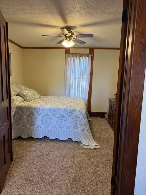 Bedroom - 315 W 1st St, Bennett, IA 52721 photo 5 of 6