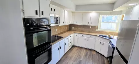 Kitchen - 110 Duell St, Milmine, IL 61855 photo 1 of 2