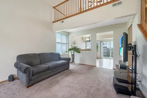 Living - 900 Symphony Dr, Aurora, IL 60504 photo 2 of 2