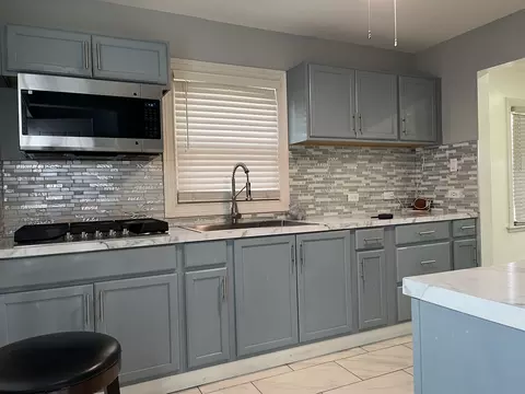 Kitchen - 93 E 151st St, Harvey, IL 60426 photo 3 of 3