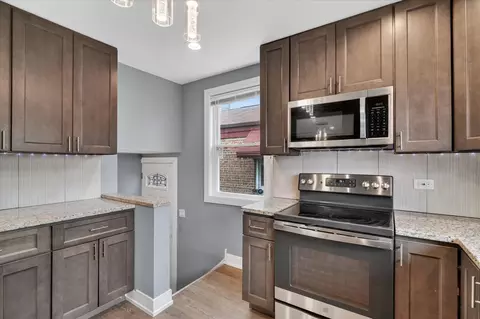 Kitchen - 11038 S Eberhart Ave, Chicago, IL 60628 photo 4 of 6