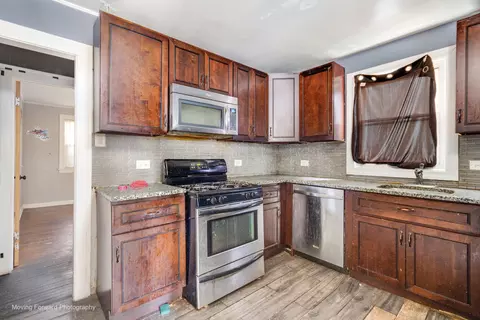 Kitchen - 201 E 143rd St, Dolton, IL 60419 photo 1 of 2
