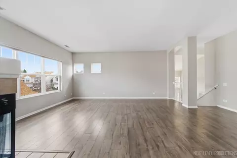 Living - 1102 Delta Dr #1102, Elgin, IL 60123 photo 6 of 7