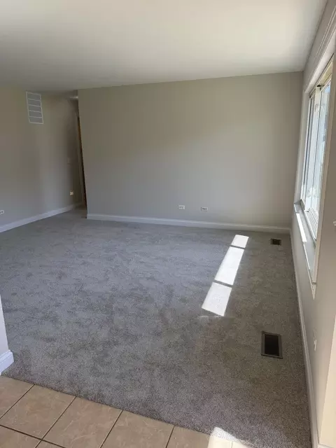 Living - 681 Thorntree Ct #A1, Bartlett, IL 60103 photo 1 of 2