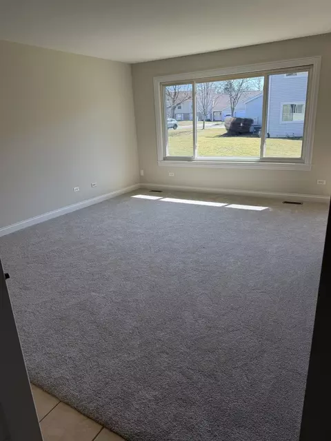 Living - 681 Thorntree Ct #A1, Bartlett, IL 60103 photo 2 of 2