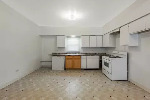 Kitchen - 832 E 153 St, Phoenix, IL 60426 photo 2 of 3