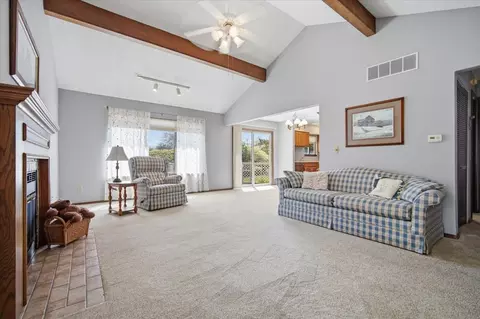 Living - 2 Sun Pointe Ct #2A, Bloomington, IL 61704 photo 2 of 3