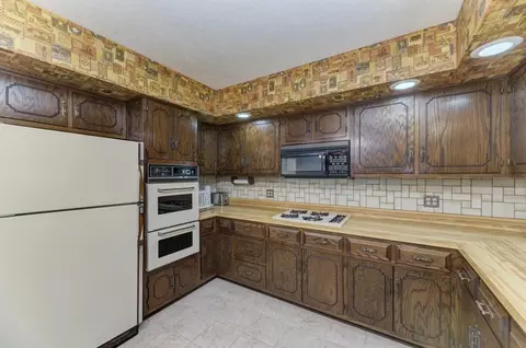 Kitchen - 705 N School St, Braidwood, IL 60408 photo 3 of 5