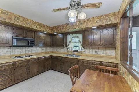 Kitchen - 705 N School St, Braidwood, IL 60408 photo 2 of 5