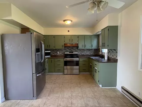 Kitchen - 419 E Cleveland St, Cullom, IL 60929 photo 2 of 3