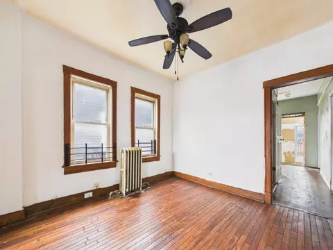 Living - 827 E 87th Pl, Chicago, IL 60619 photo 3 of 4