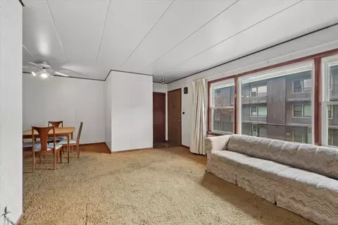 Living - 9620 W Higgins Rd #2D, Rosemont, IL 60018 photo 2 of 2