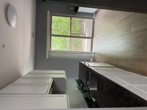 Kitchen - 275 E Railroad Ave #206, Bartlett, IL 60103 photo 2 of 3