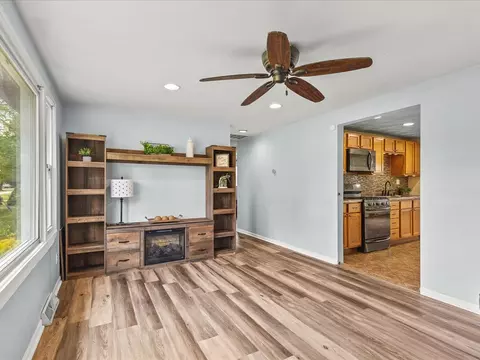 Living - 128 Wilson Ave, Machesney Park, IL 61115 photo 1 of 4