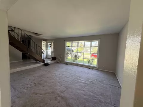 Living - 375 Longford Dr, Elgin, IL 60120 photo 2 of 7