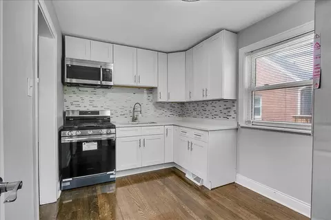 Kitchen - 9709 S Avalon Ave, Chicago, IL 60628 photo 1 of 3