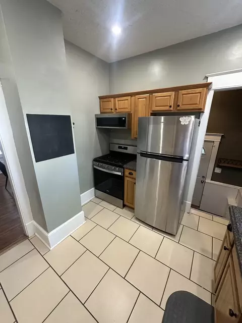 Kitchen - 1307 S Main St, Bloomington, IL 61701 photo 2 of 7