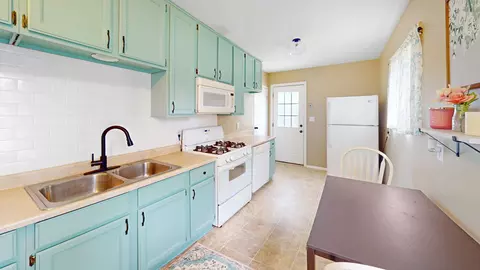 Kitchen - 311 E Jones St, Plano, IL 60545 photo 1 of 2