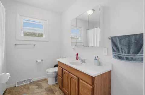 Bath - 137 E 7th St, Coal Valley, IL 61240 photo 2 of 3