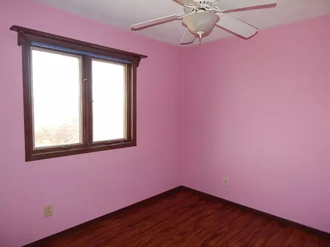 Bedroom - 513 S 7th St, Eldridge, IA 52748 photo 2 of 8