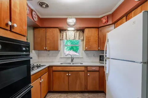 Kitchen - 302 Radliff Rd, Bloomington, IL 61701 photo 2 of 3