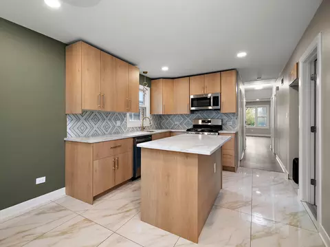 Kitchen - 14909 Martin Luther King Jr Dr, Dolton, IL 60419 photo 2 of 3