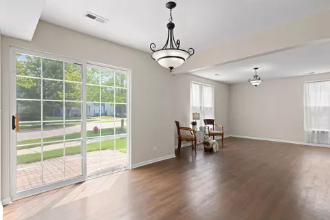 Living - 1071 Symphony Dr, Aurora, IL 60504 photo 2 of 2