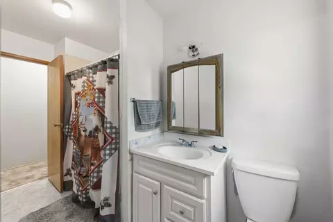 Bath - 303 Edgelawn Dr, Plano, IL 60545 photo 1 of 2
