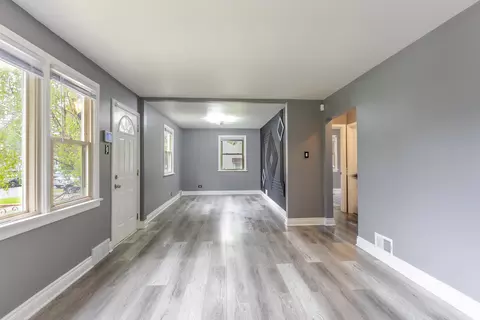 Living - 547 E 148th Pl, Harvey, IL 60426 photo 2 of 4