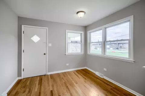 Living - 1305 E Ardyce Ln, Mount Prospect, IL 60056 photo 1 of 7
