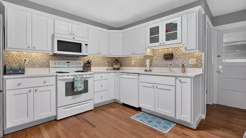 Kitchen - 1402 Maplewood Dr, Normal, IL 61761 photo 3 of 6
