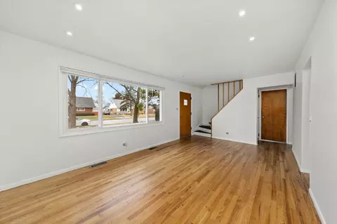 Living - 8719 Olympic Dr, Bridgeview, IL 60455 photo 3 of 4