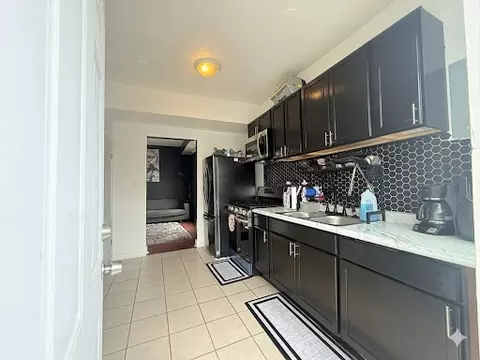Kitchen - 4829 S Champlain Ave, Chicago, IL 60615 photo 3 of 3