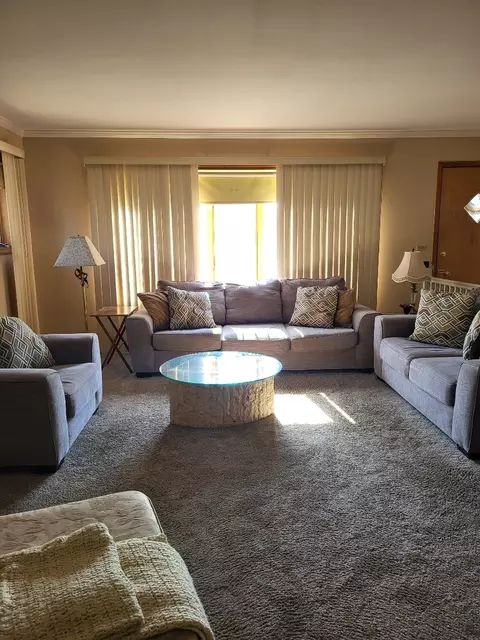 Living - 7710 W 66th St, Summit, IL 60501 photo 2 of 2