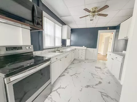 Kitchen - 308 E 2nd St, Rock Falls, IL 61071 photo 2 of 6
