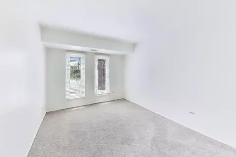 Bedroom - 1425 Sandpebble Dr #104, Wheeling, IL 60090 photo 3 of 4