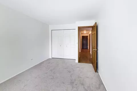 Bedroom - 1425 Sandpebble Dr #104, Wheeling, IL 60090 photo 4 of 4