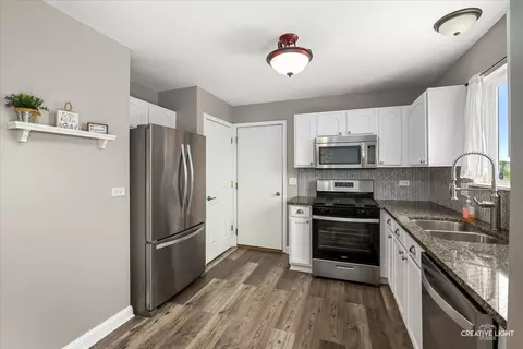 Kitchen - 352 Coneflower Dr, Minooka, IL 60447 photo 3 of 3