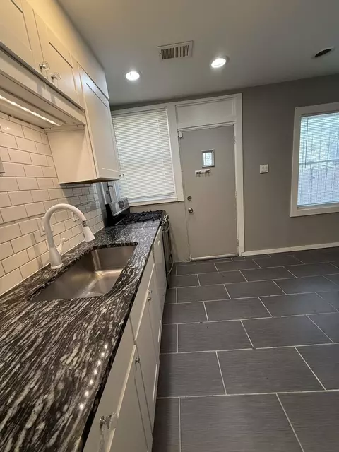 Kitchen - 2448 E 74th St, Chicago, IL 60649 photo 5 of 8