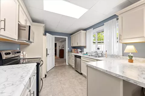 Kitchen - 27 Hickory Ln, White Heath, IL 61884 photo 9 of 11
