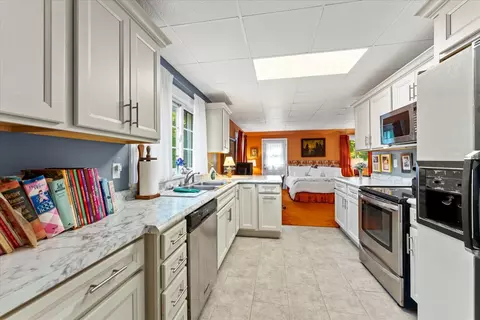 Kitchen - 27 Hickory Ln, White Heath, IL 61884 photo 8 of 11