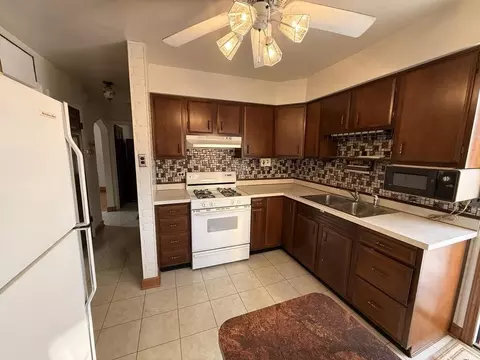 Kitchen - 256 E 143rd St, Dolton, IL 60419 photo 2 of 2