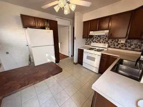 Kitchen - 256 E 143rd St, Dolton, IL 60419 photo 1 of 2